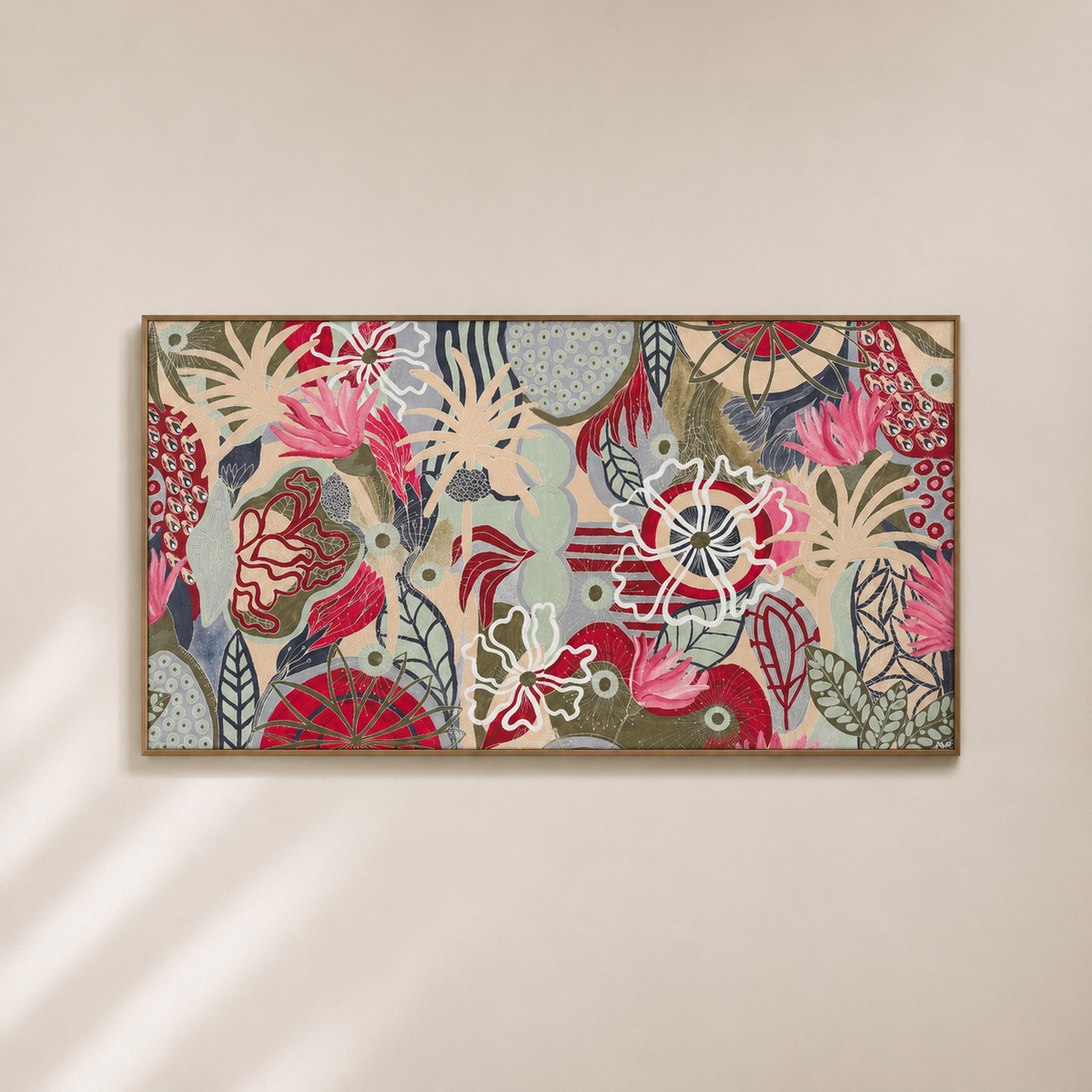 A framed rectangular wall art piece featuring an abstract floral and botanical pattern in pink, red, beige, gray, and green tones, hung on a warm beige wall with soft diagonal shadows.